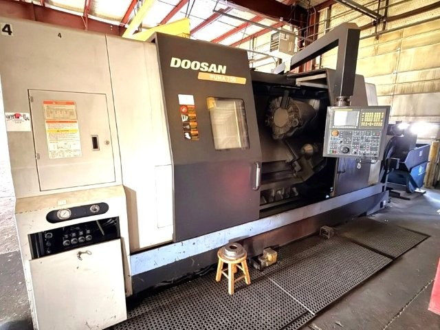 DOOSAN PUMA 700,32 CHUCk,40.6 ,63 cc,60HP,12-STN,7.1 BORE,1500-RPM,FANUC-2012